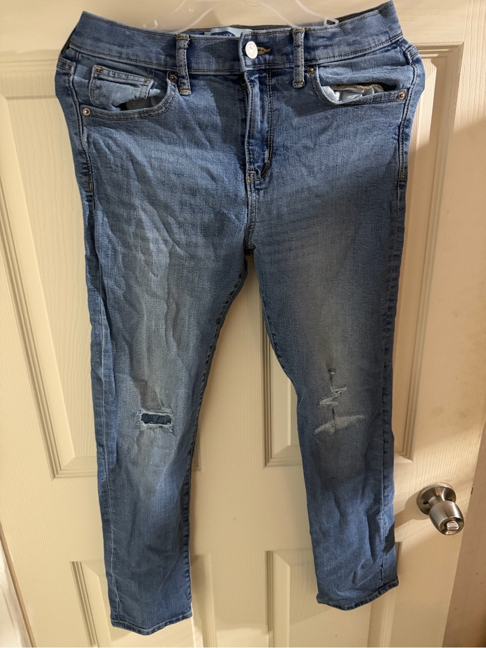 Light Wash Distressed Slim Jeans